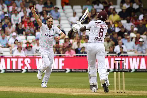 Chris Woakes celebrates Alzarri Joseph's wicket